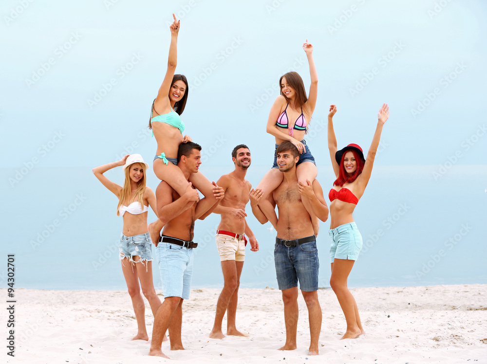 Beautiful young people having fun on beach Beautiful young people having fun on beach