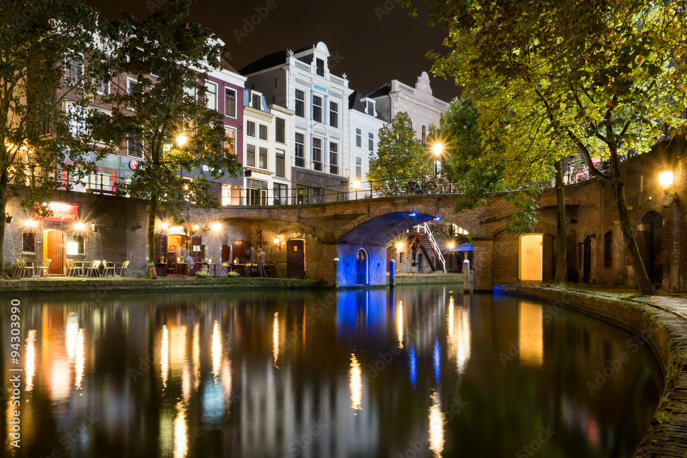 Wharf level night view of Oudegracht canal in the old city centre of Utrecht, Netherlands