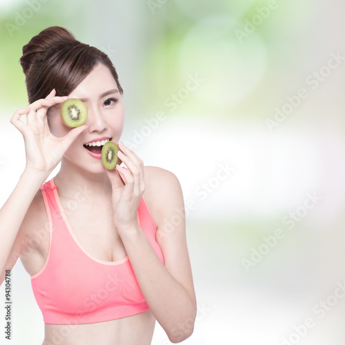 Beauty woman and Kiwi fruit