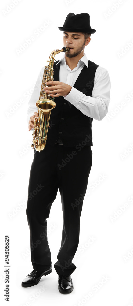 Fototapeta premium Happy saxophonist plays music on sax in elegant suit on white background