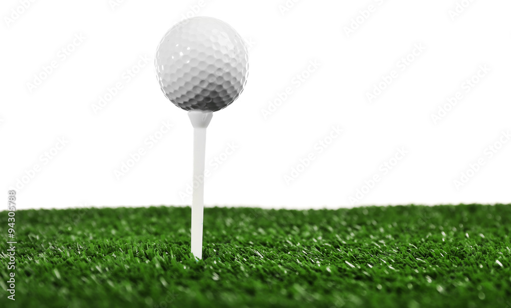 Golf ball on grass isolated on white Golf ball on grass isolated on white