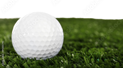 Golf set on grass isolated on white