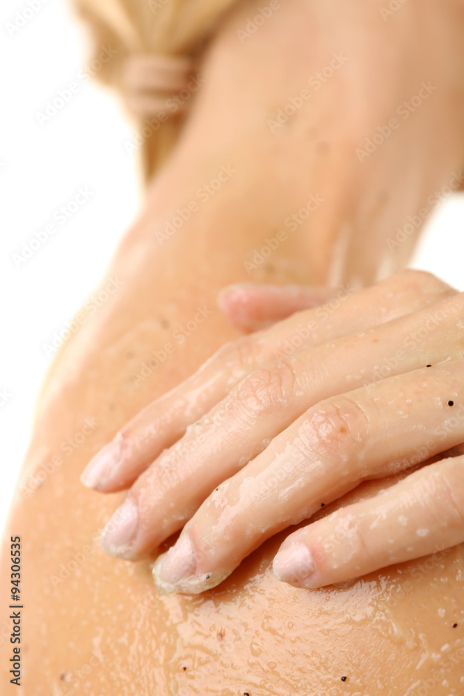 Woman using body scrub isolated on white Woman using body scrub isolated on white