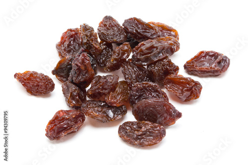 Heap of raisins isolated on white