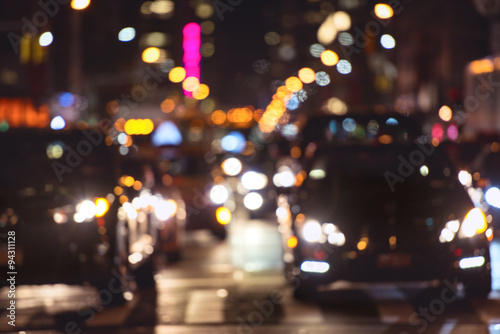 Rush hour car traffic on the night street in New York City © Nick Starichenko