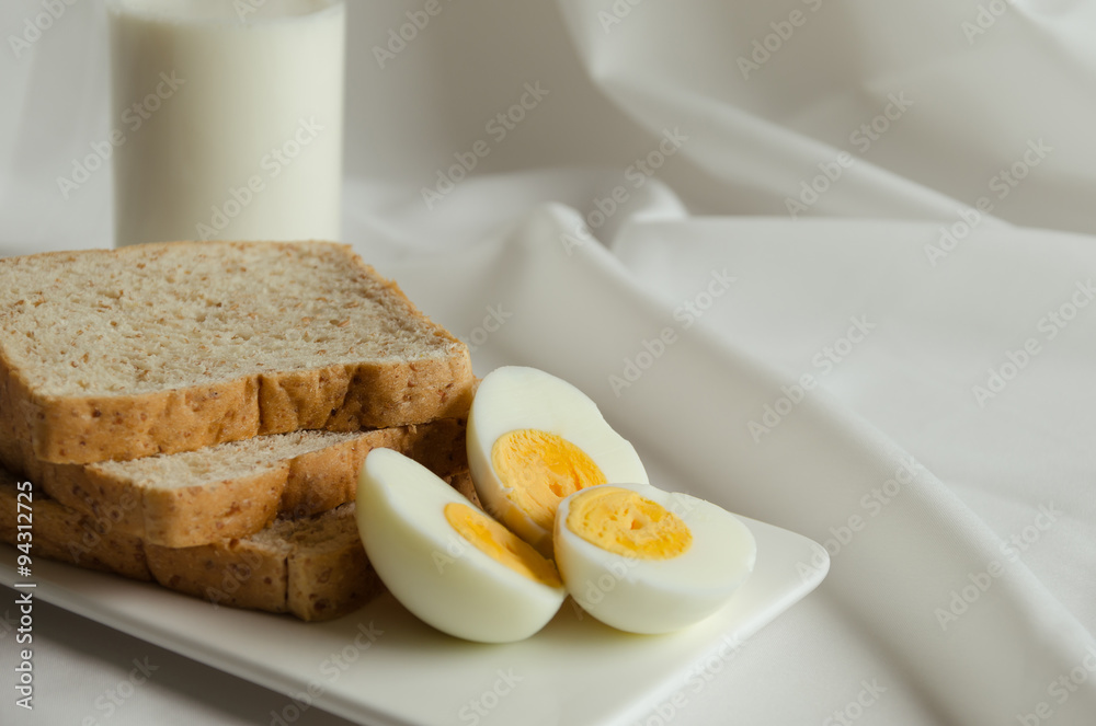 Easy Breakfast with Whole Grain Bread, Boiled Egg and Milk. Easy Breakfast with Whole Grain Bread, Boiled Egg and Milk.