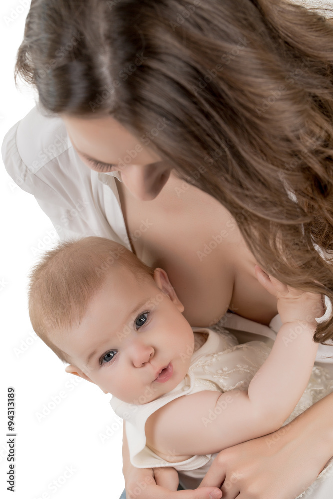 Mother and child. Adorable kid looking at camera Mother and child. Adorable kid looking at camera