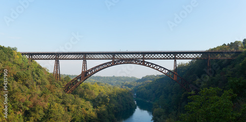 Iron bridge over the river Adda Lecco Italy © michelangeloop