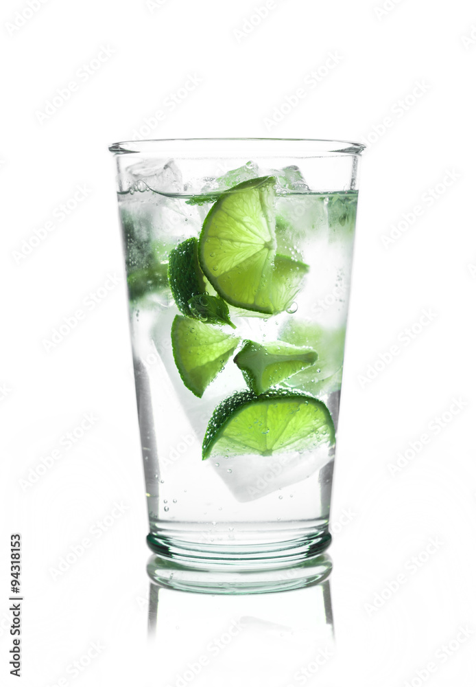 Fresh cocktail with lime slices isolated on white background Fresh cocktail with lime slices isolated on white background