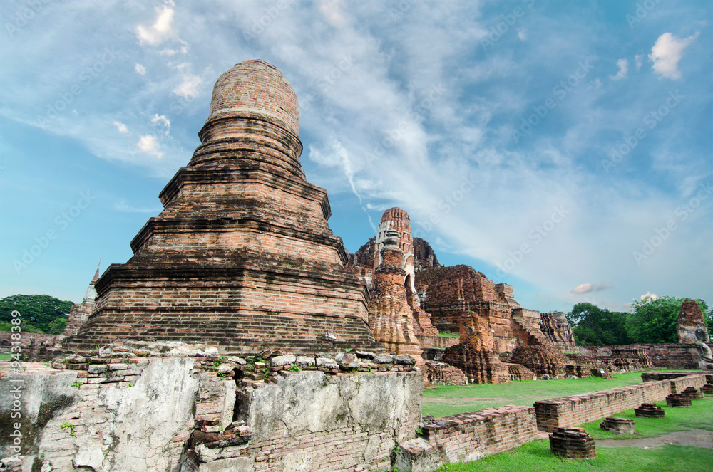 Old buddha pagoda temple with cloudy white sky in Ayuthaya Thailand