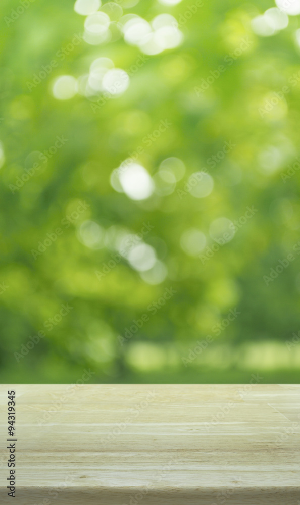 Empty table and blurred tree bokeh background for your product d Empty table and blurred tree bokeh background for your product d