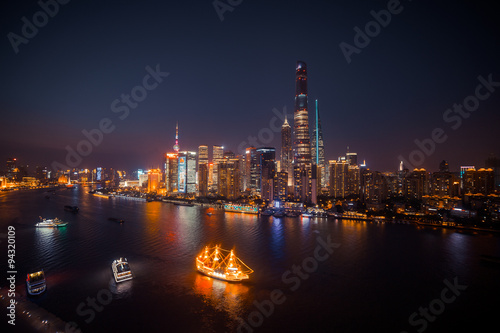 Panorama view of Shanghai city scape at night time. Aerial 