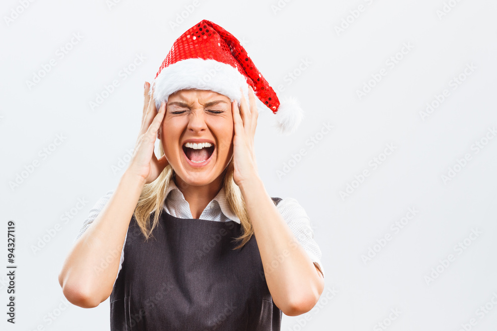 Frustrated business woman with Santa Hat Frustrated business woman with Santa Hat