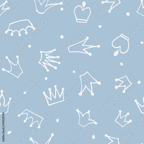 Cute hand drawn blue seamless pattern with crowns for little prince. Can be used to design children's clothing, birthday invitation. Vector illustration.