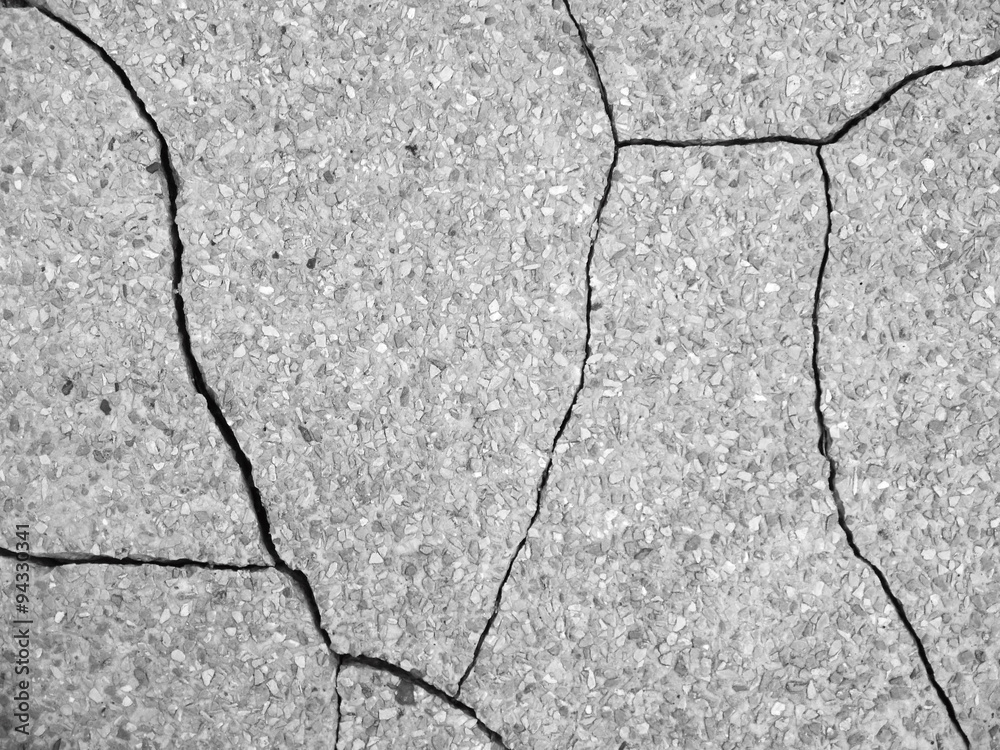 Obraz premium Crack on the gray stone background