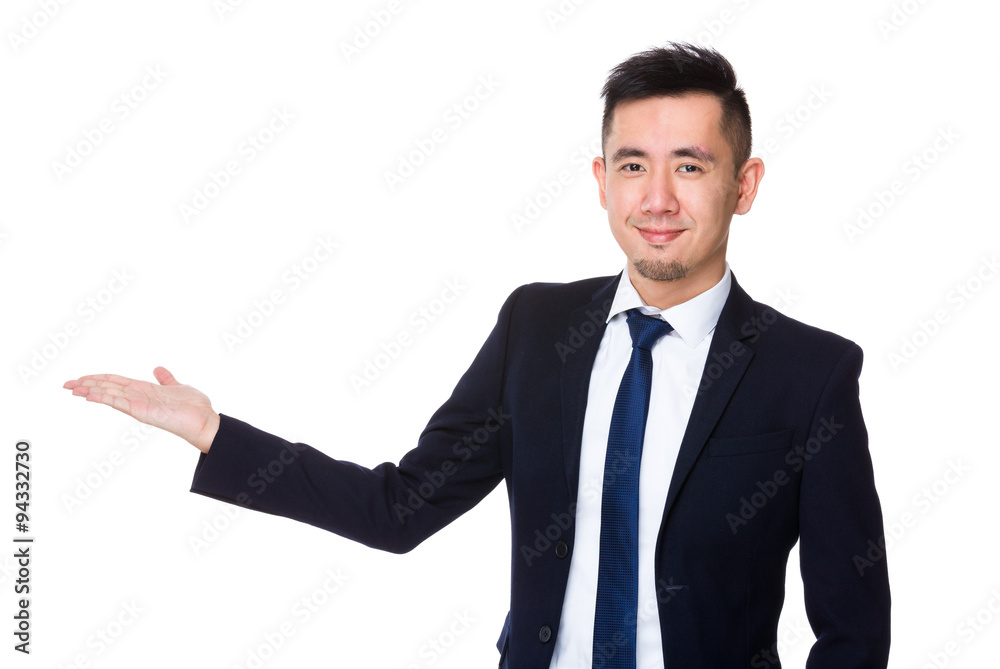 Young Businessman with hand showing blank sign Young Businessman with hand showing blank sign