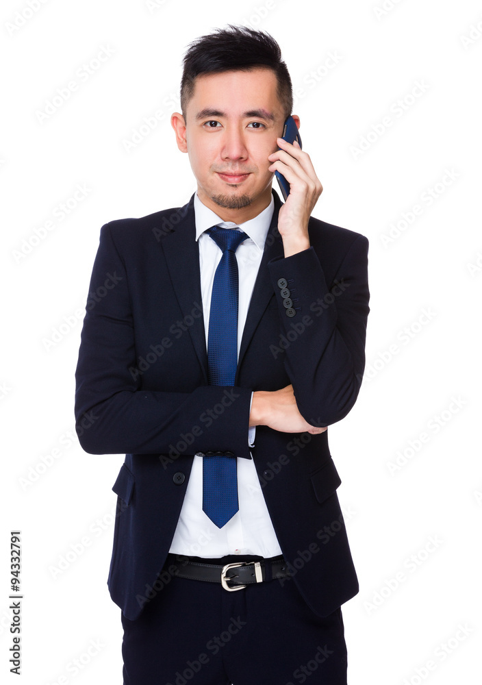 Asian young Businessman chat on mobile phone Asian young Businessman chat on mobile phone