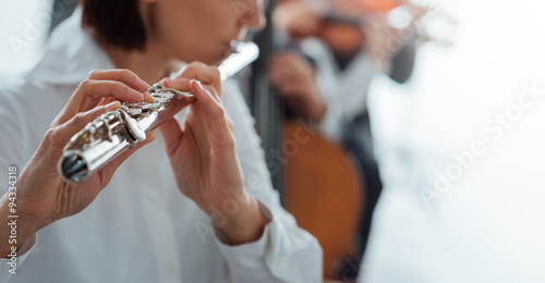 Professional flute player performing