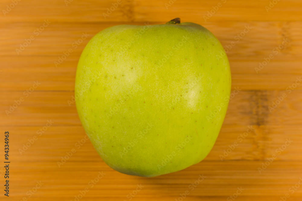Apple on wooden background