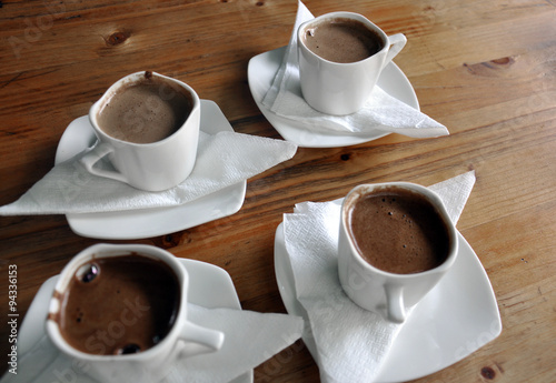 Cups of Turkish coffee on the vintage brown table