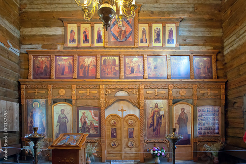 Iconostasis in ancient wooden Christian church. Russia