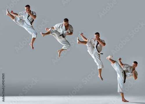Man in white kimono training karate