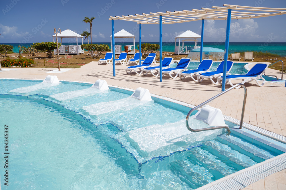 Cayo Coco island, Cuba Sep 2, 2015, nice amazing inviting gorgeous relaxing view of outdoor spa landscape and grounds with natural sea water pool and beach beds