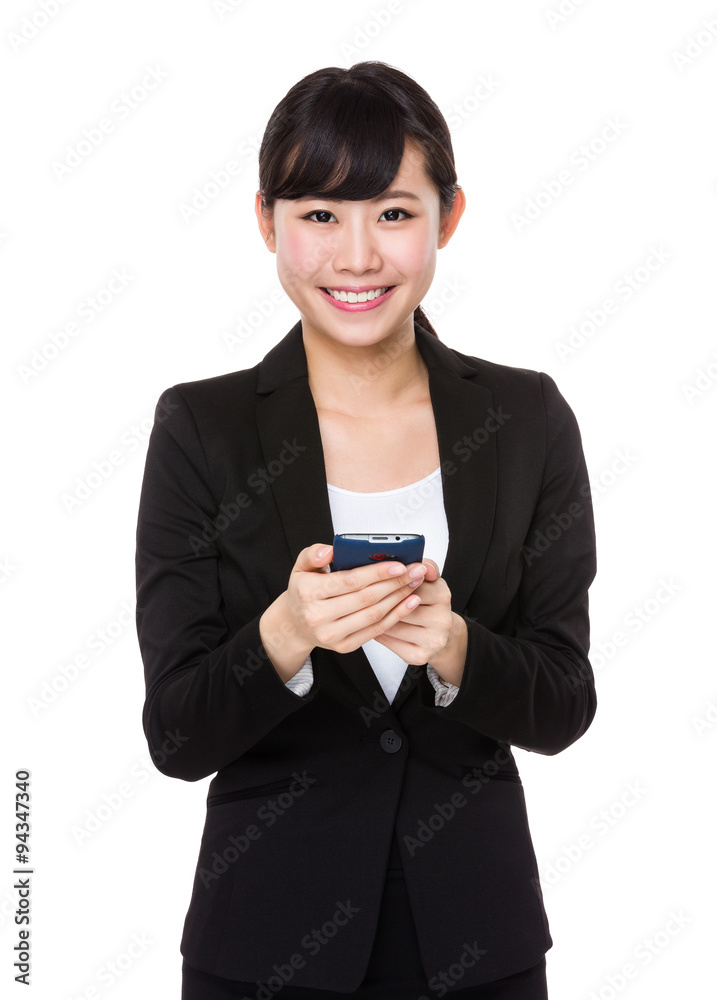 Young Businesswoman use of the cellphone Young Businesswoman use of the cellphone