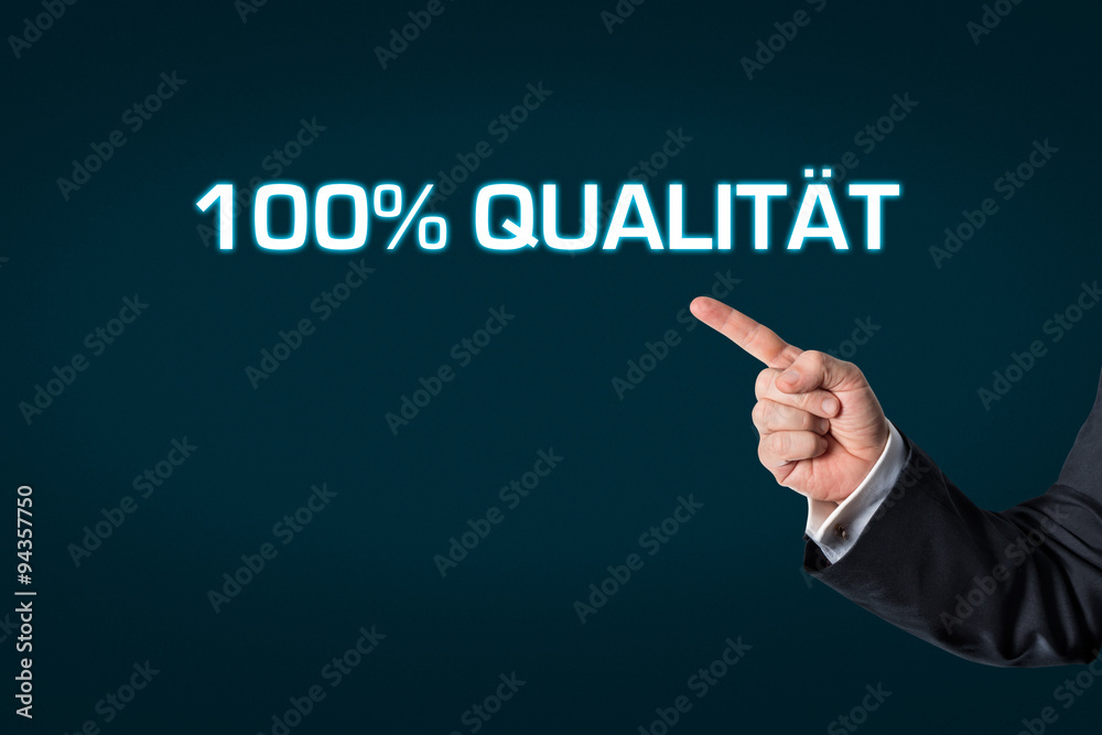 Business man pointing at the words 100% Quality Business man pointing at the words 100% Quality
