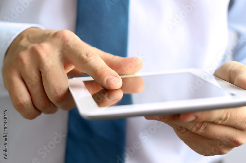 Businessman working with digital tablet