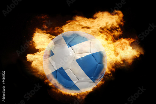 football ball with the flag of scotland on fire