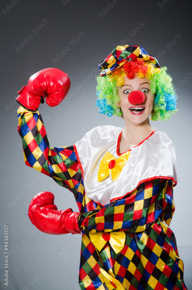 Funny clown with boxing gloves Funny clown with boxing gloves