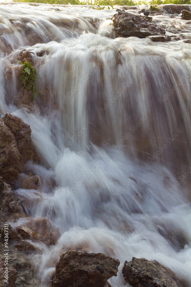Blurred stream waterfall.