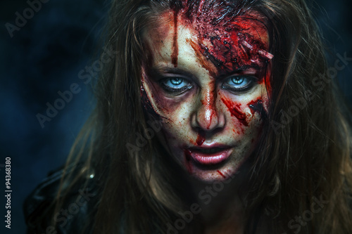 Close-up portrait of horrible zombie woman. Horror. Halloween 