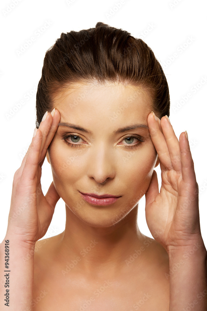 Spa woman with make up touching her face. Spa woman with make up touching her face.