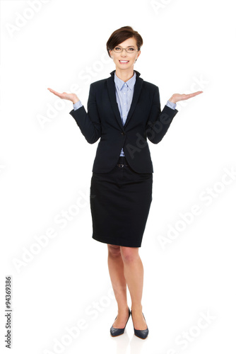 Businesswoman showing two empty hands.