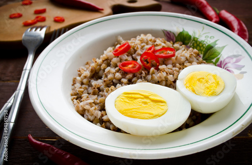 Buckwheat porridge with boiled egg and chili pepper