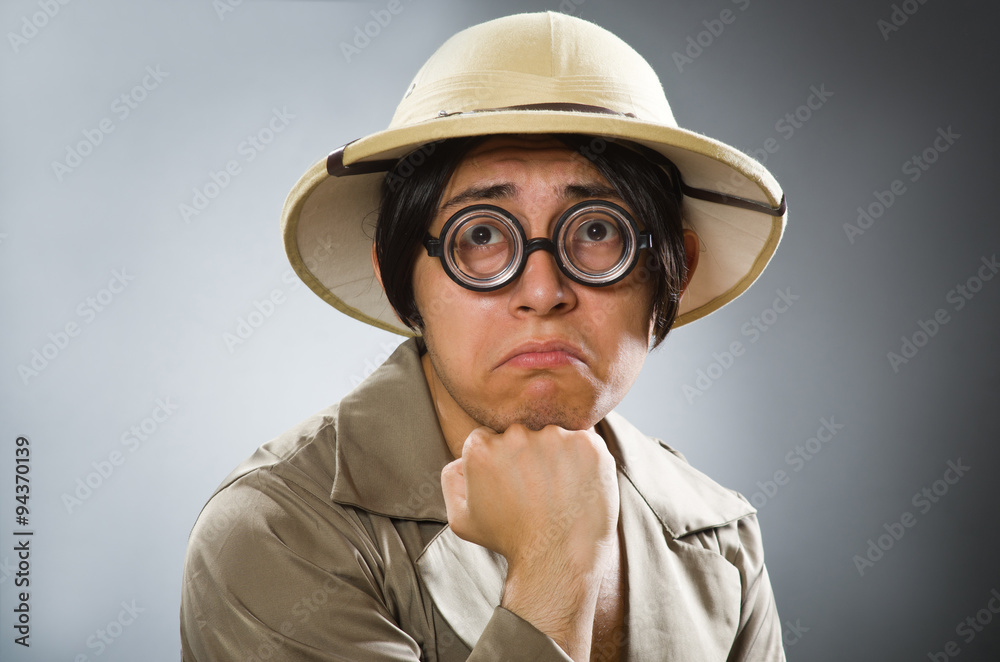 Man wearing safari hat in funny concept Man wearing safari hat in funny concept