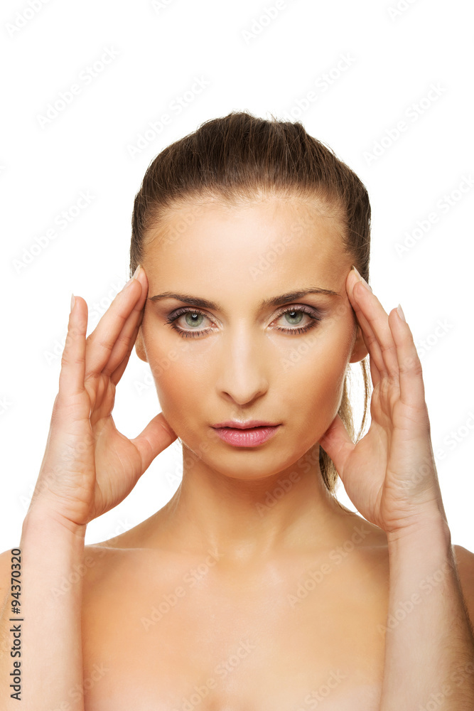Spa woman with make up touching her face. Spa woman with make up touching her face.