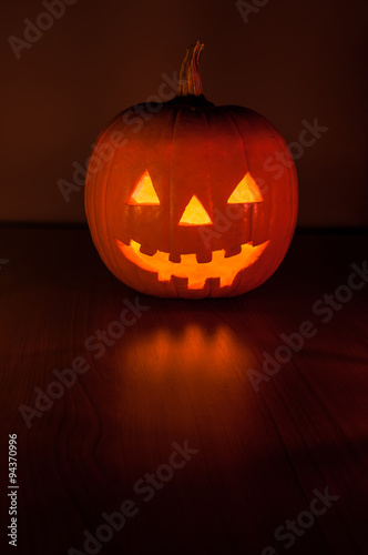Halloween pumpkin glowing in the dark