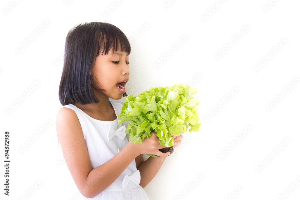 Children girl is expressions of healthy food on white background Children girl is expressions of healthy food on white background