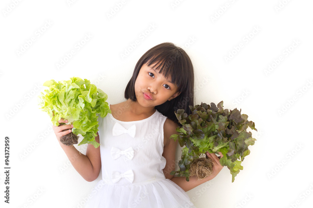 Children girl is expressions of healthy food on white background Children girl is expressions of healthy food on white background