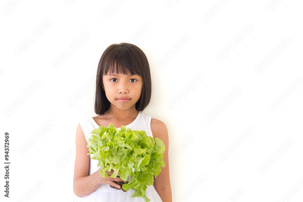 Children girl is expressions of healthy food on white background Children girl is expressions of healthy food on white background
