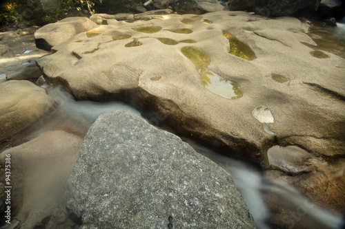 Potholes in granite bedrock of Diana's Baths, Bartlett, New Hampshire. photo