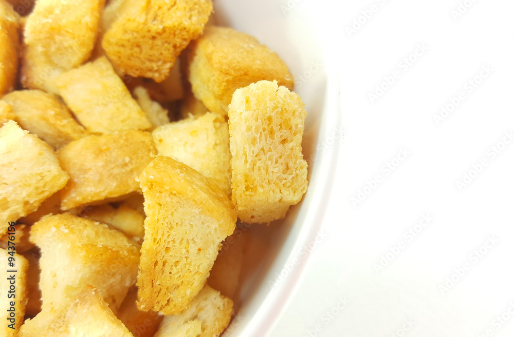 Close up of crispy bread on white background Close up of crispy bread on white background