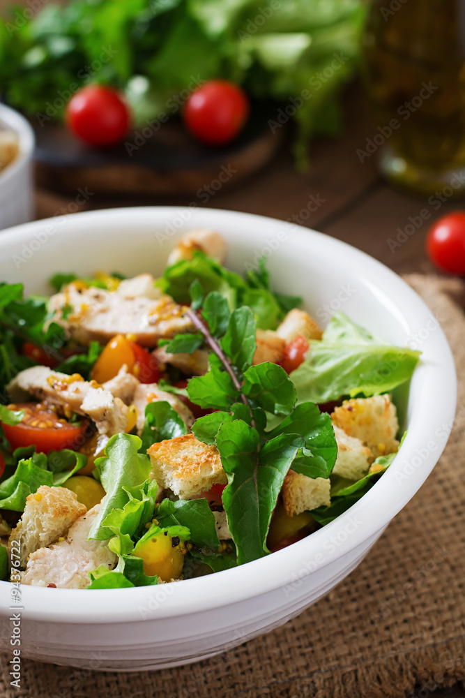 Fresh salad with chicken breast, arugula, lettuce and tomato. Fresh salad with chicken breast, arugula, lettuce and tomato.