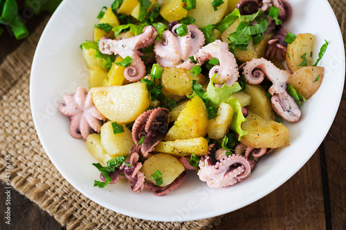 Potato salad with pickled octopus and green onions
