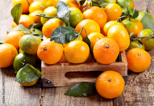 fresh mandarin oranges fruit  in wooden box