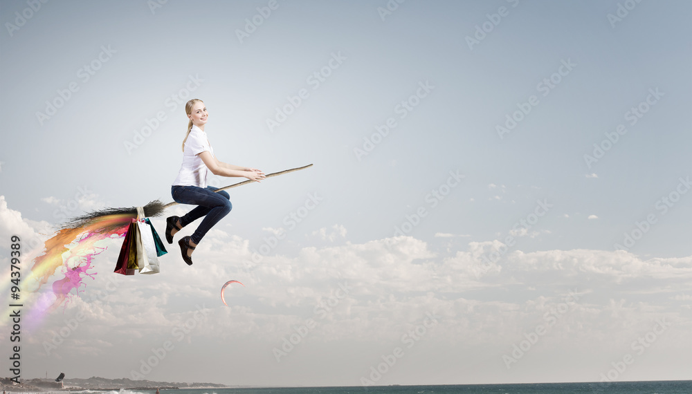 Naklejka premium Girl fly on broom