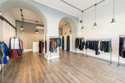 Interior of fashion clothing shop photo